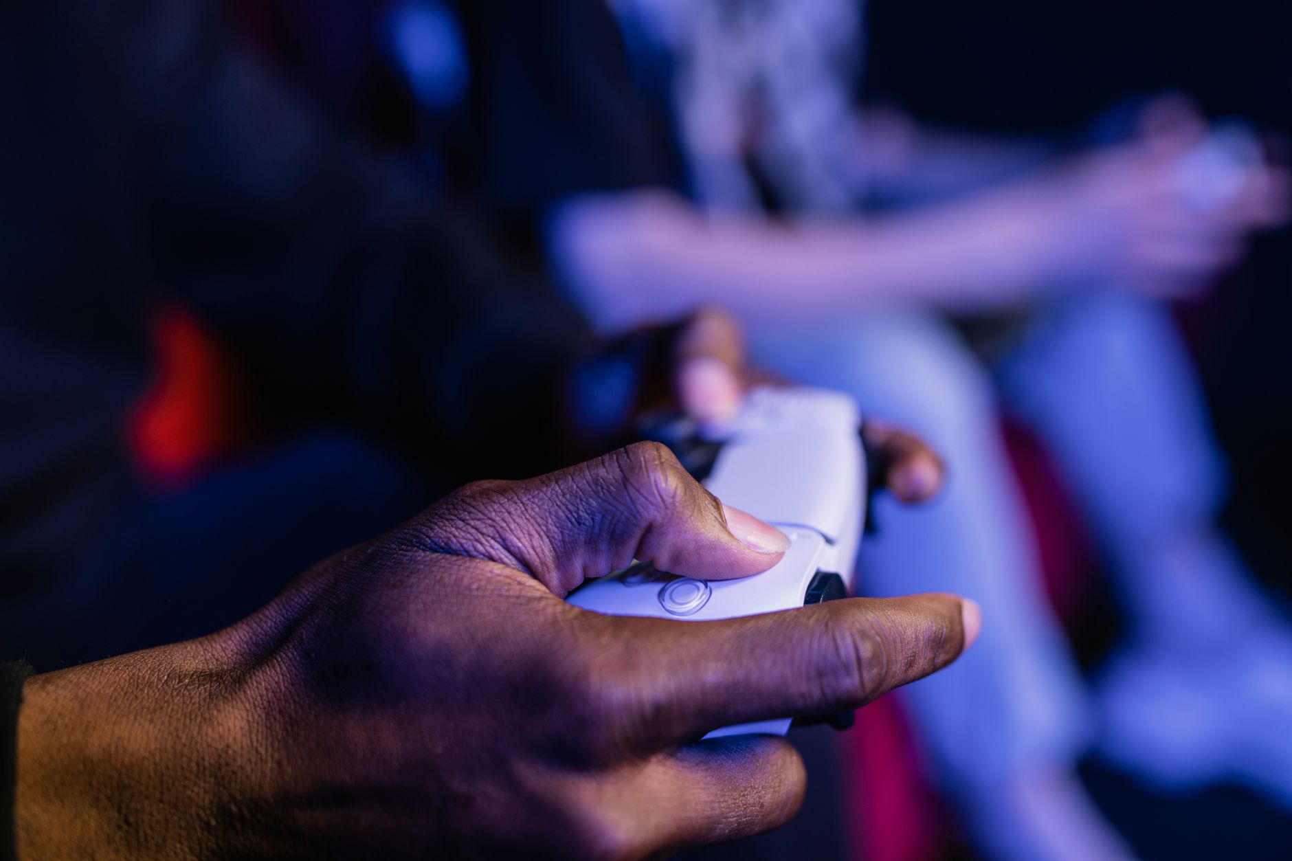 A close-up shot showing hands holding a video game controller, perfect for gaming themes.