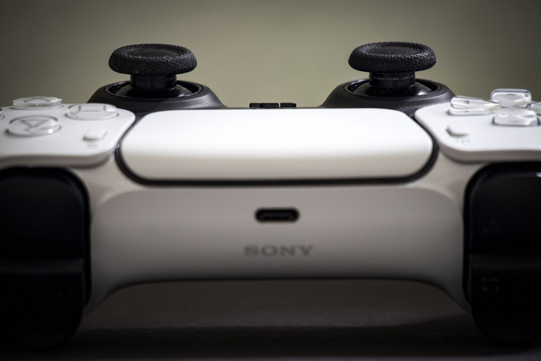 Detailed view of a Sony PlayStation 5 DualSense controller, highlighting design and features.