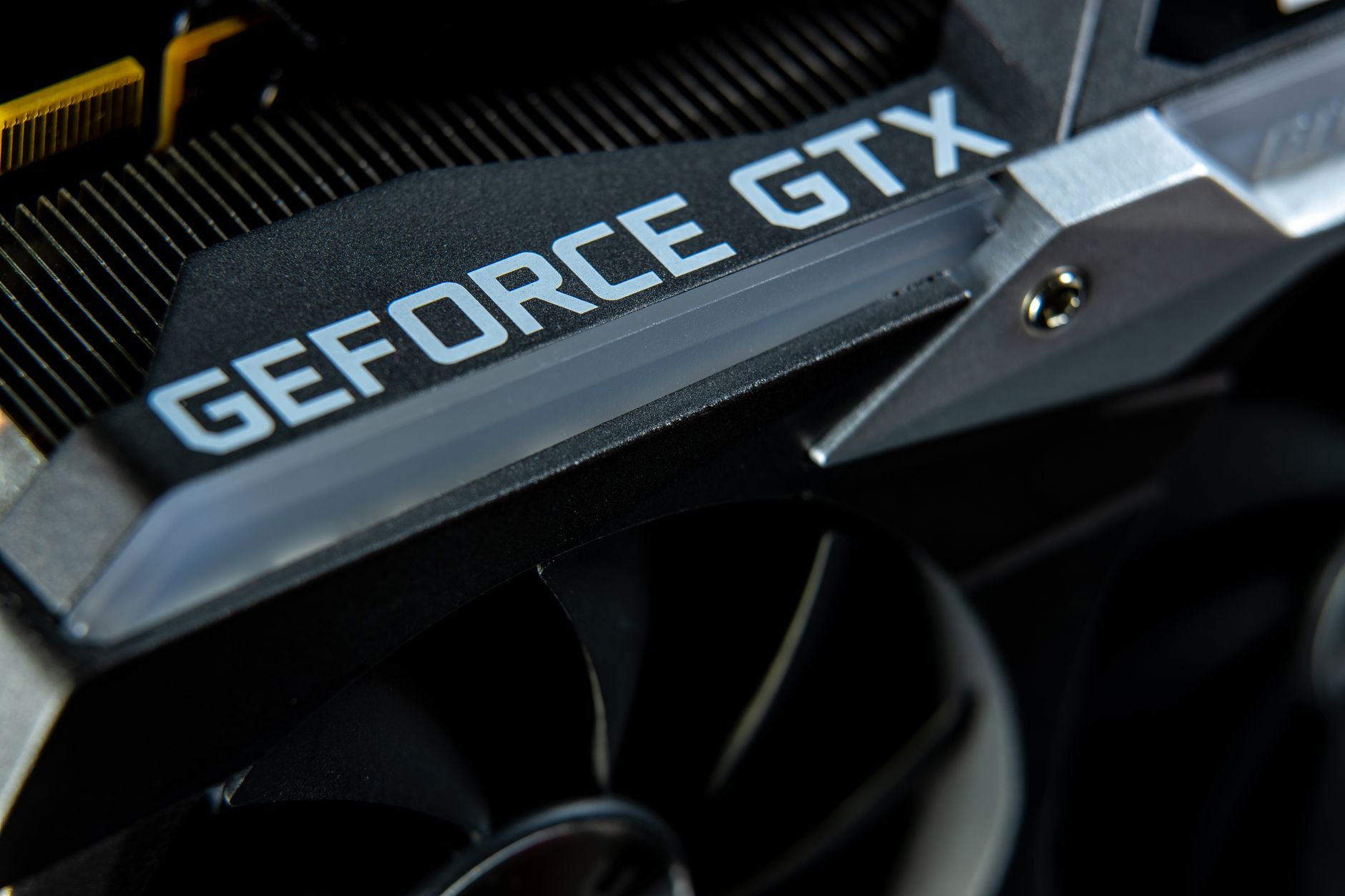 Detailed close-up of a GeForce GTX graphics card showing hardware components.